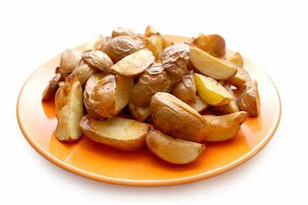 simsearch:400-04351737,k - Potatoes baked in their jackets on orange plate Stock Photo - Budget Royalty-Free & Subscription, Code: 400-04241509