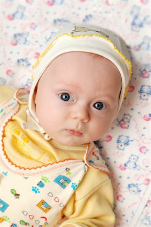 simsearch:400-04100917,k - Little boy with big blue eyes lies on nappies Stock Photo - Budget Royalty-Free & Subscription, Code: 400-04241519