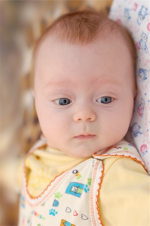 simsearch:400-07211187,k - Little 4-months with big blue eyes boy looking down Photographie de stock - Aubaine LD & Abonnement, Code: 400-04241520