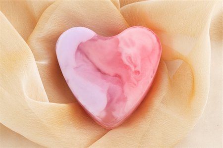 simsearch:400-04501066,k - Pink soap in the form of the heart  on the cloth Stock Photo - Budget Royalty-Free & Subscription, Code: 400-04241572