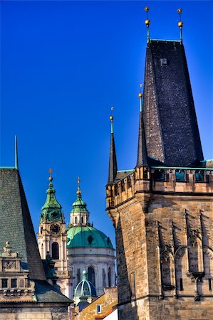 simsearch:400-05048500,k - Famous church at one end of Charles bridge on the river in Prague. Stock Photo - Budget Royalty-Free & Subscription, Code: 400-04241591