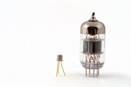 Transistor next to a vacuum tube on a white background Stock Photo - Budget Royalty-Free & Subscription, Code: 400-04242140