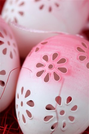 simsearch:400-04291976,k - Flowery Easter eggs on red background. Shallow dof Photographie de stock - Aubaine LD & Abonnement, Code: 400-04242525