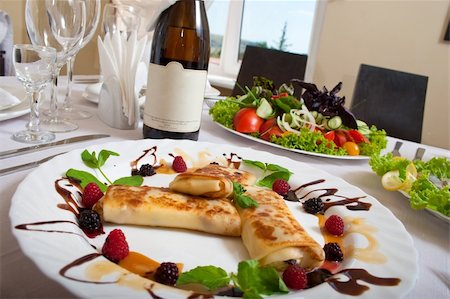 pancake top view - table with tasty dishes set for a dinner Stock Photo - Budget Royalty-Free & Subscription, Code: 400-04242657