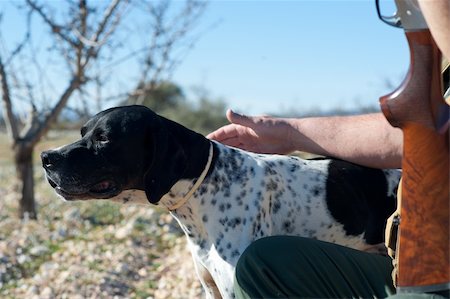 simsearch:400-04288829,k - A hunter and his dog, a strong parntership Photographie de stock - Aubaine LD & Abonnement, Code: 400-04242897