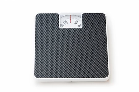 simsearch:400-08260357,k - Dieting concept with scales isolated on the white Stock Photo - Budget Royalty-Free & Subscription, Code: 400-04243093