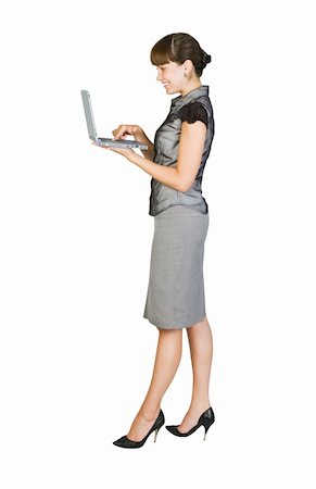 simsearch:400-05732500,k - Beautiful businesswoman with laptop.Isolated on white background Foto de stock - Royalty-Free Super Valor e Assinatura, Número: 400-04243129