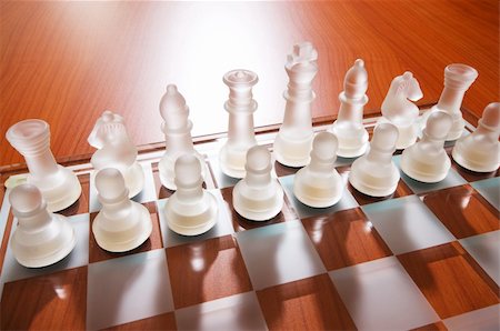 simsearch:649-07279761,k - Set of chess figures on the playing board Foto de stock - Royalty-Free Super Valor e Assinatura, Número: 400-04243177