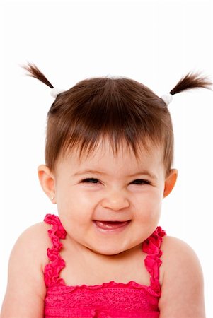 Face of cute happy smiling laughing baby infant girl with ponytails giggling, isolated. Stock Photo - Budget Royalty-Free & Subscription, Code: 400-04255340