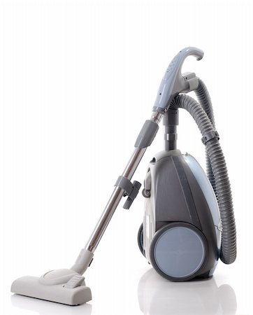 domestic floor cleaners - vacuum cleaner isolated over white Stock Photo - Budget Royalty-Free & Subscription, Code: 400-04255640