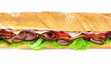 simsearch:400-05255035,k - Giant ham, tomato, lettuce, cheese and onion sub ready to serve. Stock Photo - Budget Royalty-Free & Subscription, Code: 400-04256041