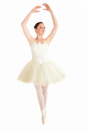 relaxed ballet dancer - Radiant ballet dancer training over white background Stock Photo - Budget Royalty-Free & Subscription, Code: 400-04256129