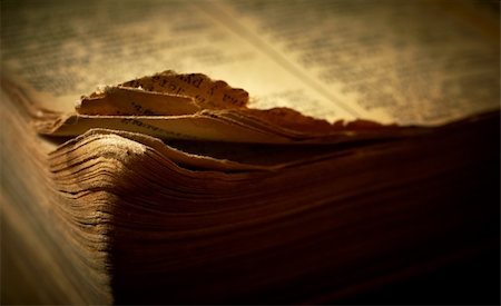 Edge of open old religious book. Shallow DOF. Stock Photo - Budget Royalty-Free & Subscription, Code: 400-04256560