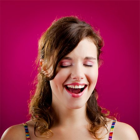 face, eyes closed, looking up - Portrait of a beautiful young woman with a silly face Stock Photo - Budget Royalty-Free & Subscription, Code: 400-04257035