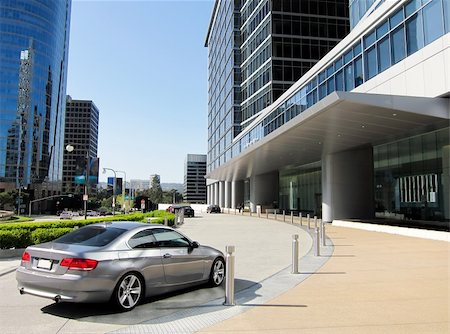 street backgrounds - Luxury car near modern building's entrance in downtown Stock Photo - Budget Royalty-Free & Subscription, Code: 400-04257798