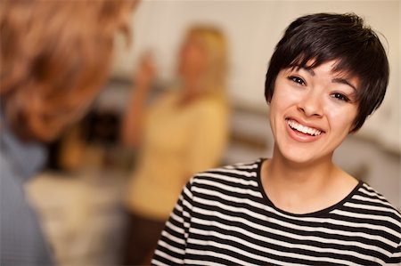 pretty woman laughter party - Laughing Young Woman Socializing in a Party Setting. Stock Photo - Budget Royalty-Free & Subscription, Code: 400-04257817