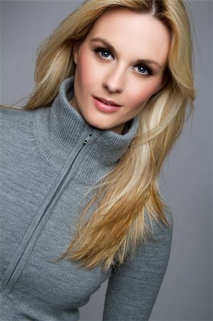 Beautiful blond woman wearing sweater Stock Photo - Budget Royalty-Free & Subscription, Code: 400-04257933