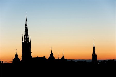 stockholm city hall - evening silhouette of Stockholm, with Riddarholmen Cathedral Stock Photo - Budget Royalty-Free & Subscription, Code: 400-04258191