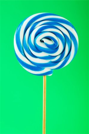 red circle lollipop - Colourful lollipop against the colourful background Stock Photo - Budget Royalty-Free & Subscription, Code: 400-04258560