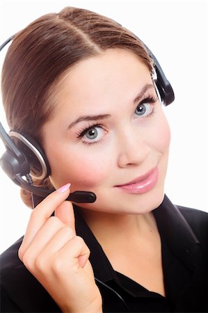 simsearch:400-04801703,k - Pretty caucasian woman with headset smiling during a telephone conversation. Foto de stock - Super Valor sin royalties y Suscripción, Código: 400-04258620