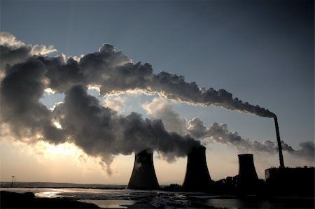 simsearch:400-05893819,k - View of coal powerplant against sun with several chimneys and huge fumes Stock Photo - Budget Royalty-Free & Subscription, Code: 400-04259326