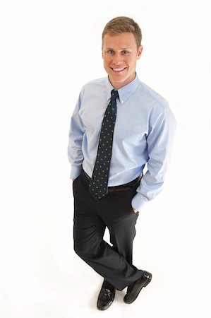 simsearch:400-07820348,k - Portrait of smiling young businessman standing Photographie de stock - Aubaine LD & Abonnement, Code: 400-04264099