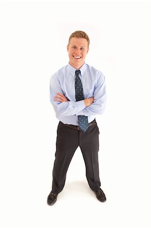 simsearch:400-05687698,k - Portrait of smiling young businessman standing  with arms crossed Stock Photo - Budget Royalty-Free & Subscription, Code: 400-04264104