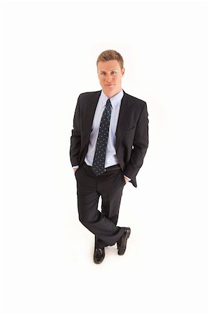 simsearch:400-05687698,k - Portrait of smiling young businessman standing Stock Photo - Budget Royalty-Free & Subscription, Code: 400-04264105