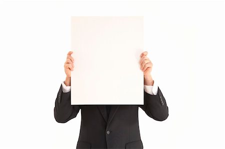 employee hold a sign - Head and shoulder portrait of businessman holding blank sign Stock Photo - Budget Royalty-Free & Subscription, Code: 400-04264129