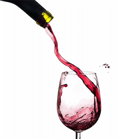 simsearch:400-04264239,k - Red wine splash on a glass, white background. Stock Photo - Budget Royalty-Free & Subscription, Code: 400-04264224