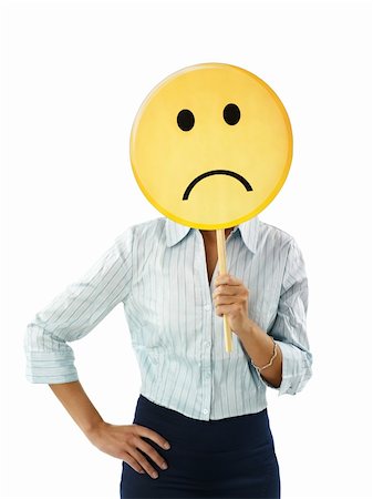 sad yellow icon - adult business woman holding sad emoticon on white background. Vertical shape, waist up Stock Photo - Budget Royalty-Free & Subscription, Code: 400-04264225
