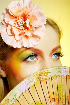 simsearch:400-04590632,k - Close-up portrait of summer fashion creative eye make-up in yellow and green tones Stock Photo - Budget Royalty-Free & Subscription, Code: 400-04264260