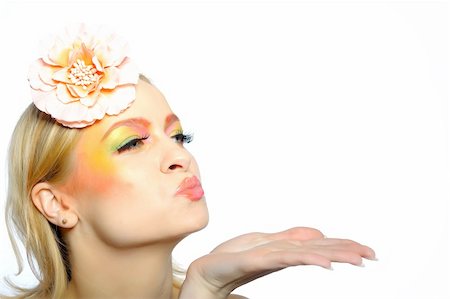 simsearch:400-04590632,k - Concept of summer fashion woman with creative eye make-up in yellow and green tones sending kisses. copy-space Stock Photo - Budget Royalty-Free & Subscription, Code: 400-04264263