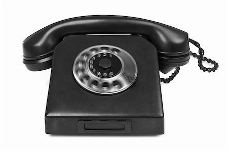 old bakelite telephone with spining dial on white, gentle natural shadow in front Stock Photo - Budget Royalty-Free & Subscription, Code: 400-04264564
