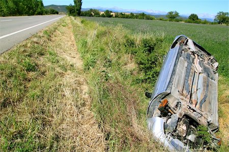 Car crash accident upside down vehicle off the road green landscape Stock Photo - Budget Royalty-Free & Subscription, Code: 400-04264763