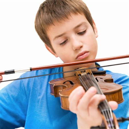 preteens fingering - caucasian boy learning to play violin, isolated on white background, square crop Stock Photo - Budget Royalty-Free & Subscription, Code: 400-04265081