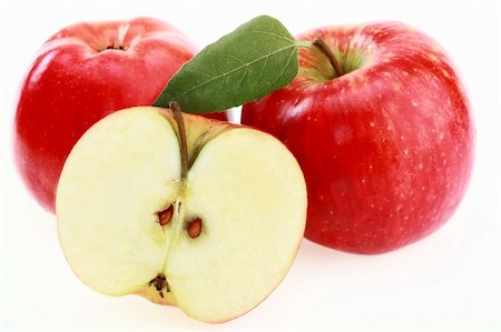 Apple red on a white background Fotografie stock - Microstock e Abbonamento, Codice: 400-04265169