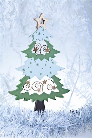 round ornament hanging of a tree - Christmas Stock Photo - Budget Royalty-Free & Subscription, Code: 400-04265287