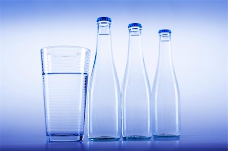 simsearch:400-06796544,k - Fresh water drink on blue background Stock Photo - Budget Royalty-Free & Subscription, Code: 400-04265458