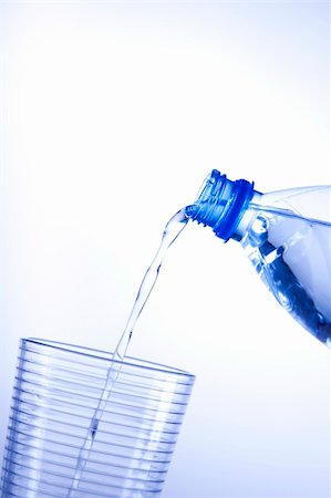 simsearch:400-06796544,k - Fresh water drink on blue background Stock Photo - Budget Royalty-Free & Subscription, Code: 400-04265469
