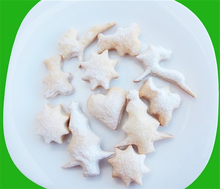 simsearch:400-07792994,k - Christmas pastry with the powdered sugar on the white plate Photographie de stock - Aubaine LD & Abonnement, Code: 400-04265471
