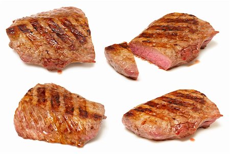 Grilled beef steaks isolated over white background set Fotografie stock - Microstock e Abbonamento, Codice: 400-04265844