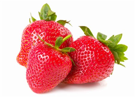 Three strawberries macro shot isolated over white background Fotografie stock - Microstock e Abbonamento, Codice: 400-04265847