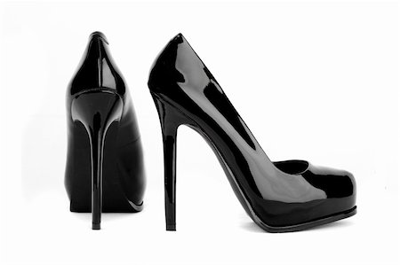 simsearch:400-04834360,k - Black high heel women shoes isolated on white Fotografie stock - Microstock e Abbonamento, Codice: 400-04265938
