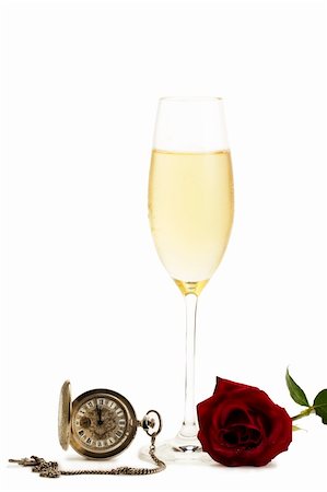 simsearch:600-01551669,k - cold glass with champagne with a red rose and a old pocket watch on white background Stock Photo - Budget Royalty-Free & Subscription, Code: 400-04266418