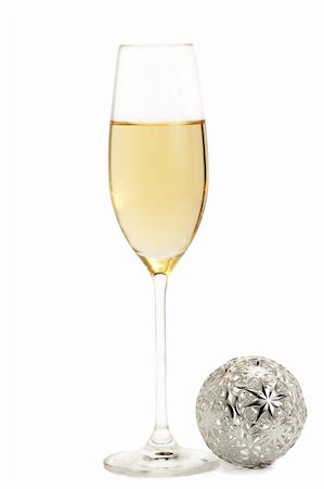 simsearch:400-06457293,k - glass of champagne with a metal christmas ball on white background Foto de stock - Super Valor sin royalties y Suscripción, Código: 400-04266426