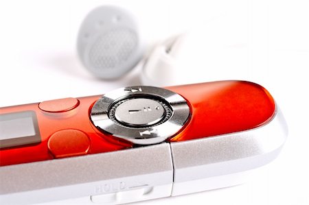 simsearch:400-04087054,k - mp3 player with headphoneson on a white background Photographie de stock - Aubaine LD & Abonnement, Code: 400-04267019