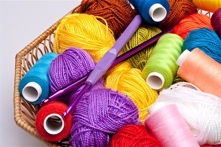 basket with thread and balls for knitting as a background Stock Photo - Budget Royalty-Free & Subscription, Code: 400-04267013