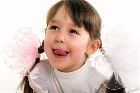 beautiful little girl teasing and fooling around Stockbilder - Microstock & Abonnement, Bildnummer: 400-04267067