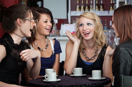 simsearch:400-04238163,k - Four college freshmen chatting in a coffee shop Stock Photo - Budget Royalty-Free & Subscription, Code: 400-04267276